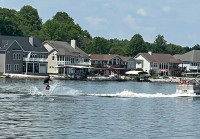 2000 Sun Tracker Party Barge wakeboarding