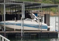 2008 Nauticstar 232DC wakeboard tower, bimini, racks and speakers