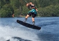 wakeboarding at lake on a 1993 Seaswirl 185SE boat