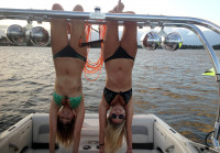 wakeboard tower with girls hanging down