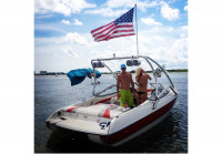 2004 Stingray 190LS wakeboard tower with American flag