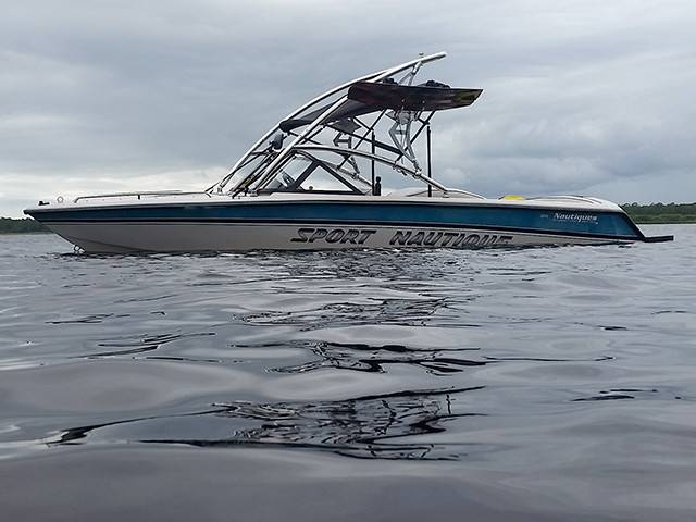 1996 Correct Craft Sport Nautique with an Assault Wakeboard Tower, photo 1 of 3