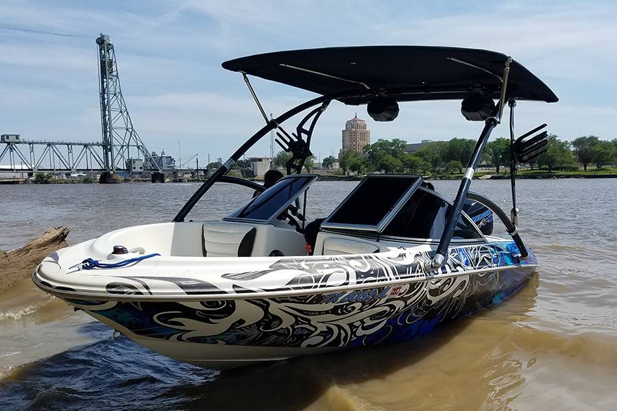 2000 Bayliner Capri with an Assault Wakeboard Tower